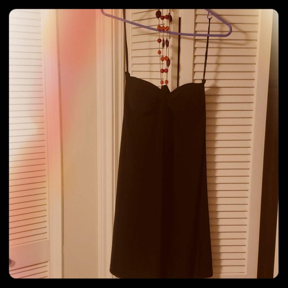 Black dress with red accent strap